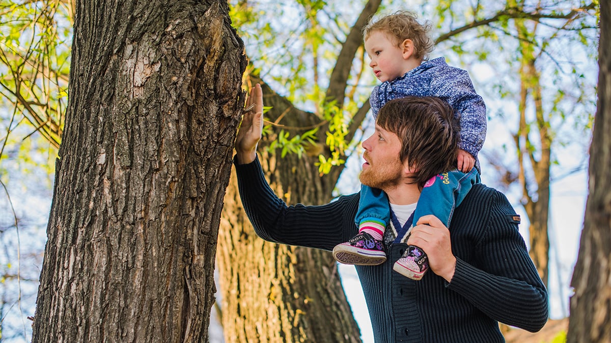 father-with-his-son-sitting-his-shoulders-1200x675